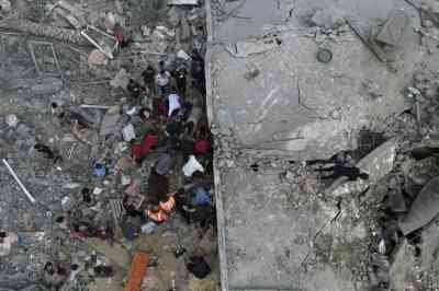 Palestinians in Deir al-Balah are looking for survivors in the rubble