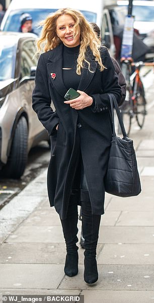 Beaming: The former Countdown star 62, appeared in fighting form as she went for a stroll in Soho, London on Friday afternoon