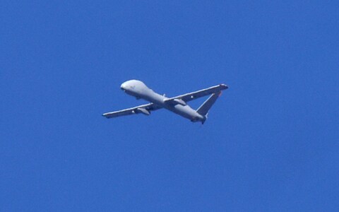 A picture taken from the Israeli side of the border with the Gaza Strip shows an Israeli military drone flying over the north of the Gaza Strip