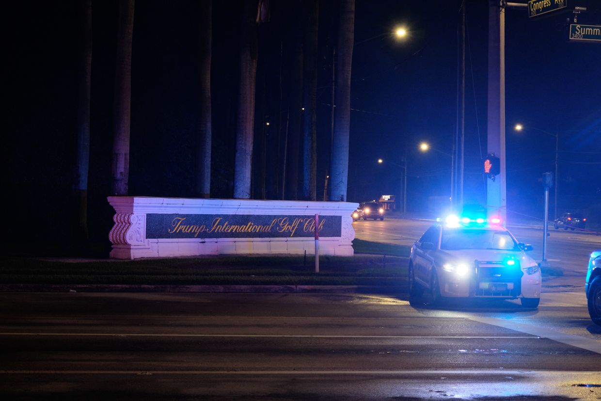 The scene outside the Trump International Golf Club in West Palm Beach is closed by the police 