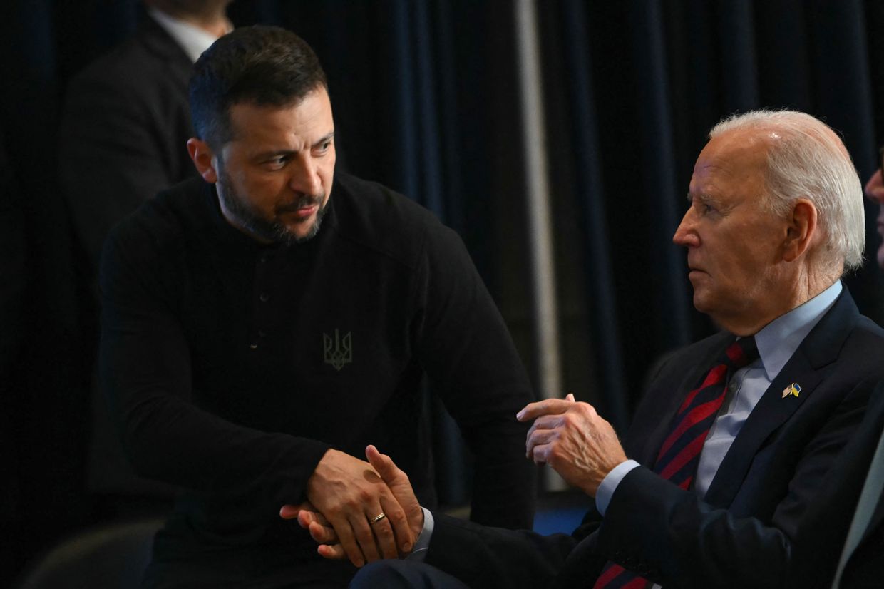 US President Joe Biden shakes hands with Ukrainian President Volodymyr Zelensky at an event with world leaders launching a Joint Declaration of Support for Ukrainian Recovery