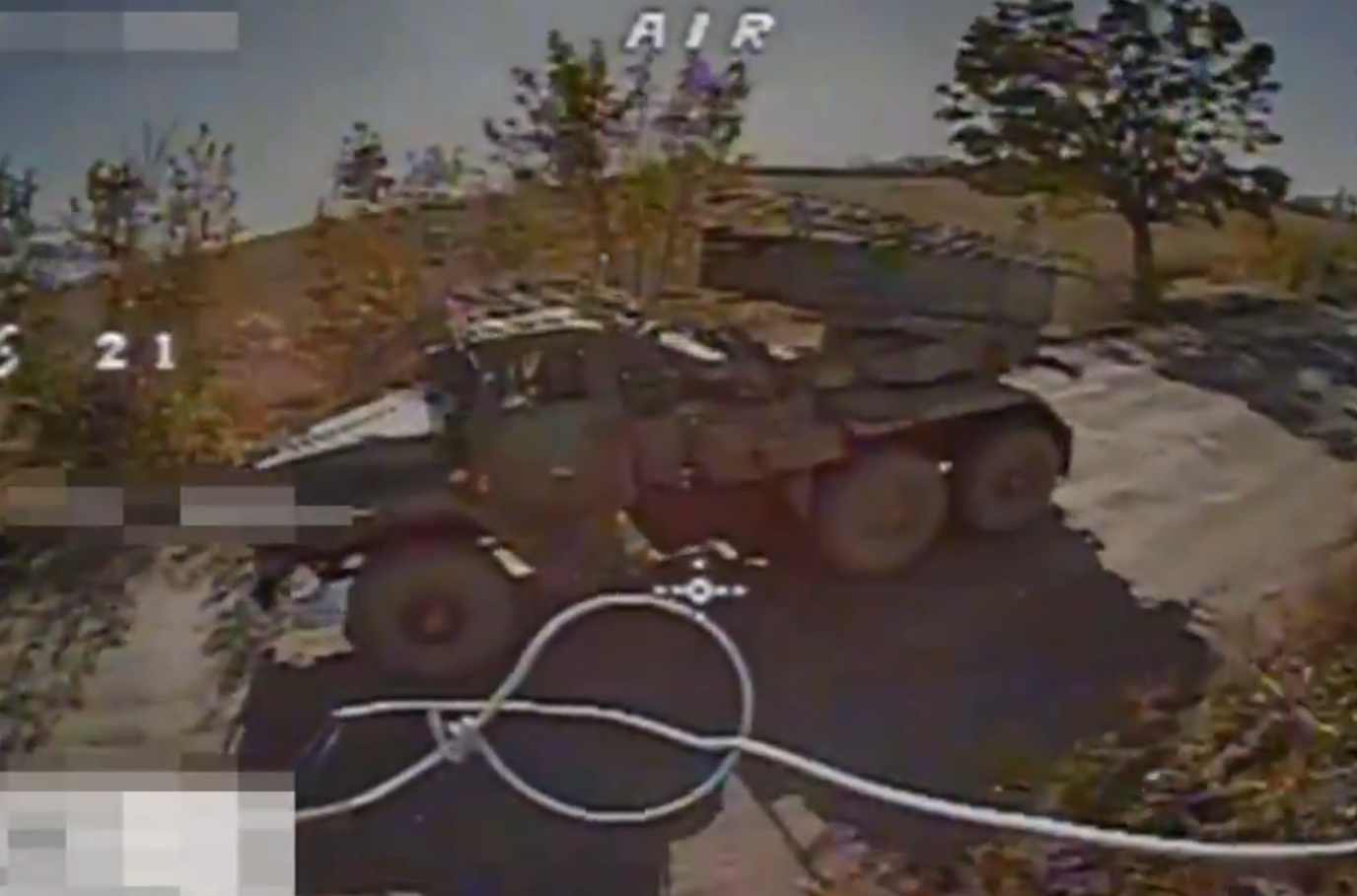 A Russian Grad missile system in the camera of a Ukrainian drone. Fall, 2024.
/p
pUkraine. Footage from SSU video